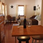 Drink wine at our kitchen bar Paso Robles vacation rental